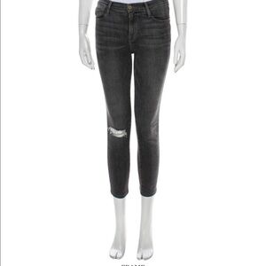 Frame dark wash skinny leg jeans pants. Distressed at the knee. Size 25